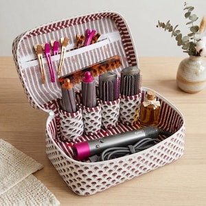 May include: A set of three ceramic mugs with a speckled, matte finish. Each mug features a different color: light blue, cream, and gray. The mugs have a simple, modern design and a comfortable handle.