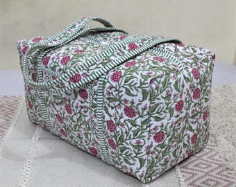 Mala de viagem acolchoada em algodão com estampa floral rosa, três tamanhos.