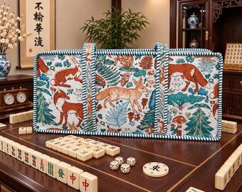 May include: A rectangular fabric storage bag featuring a repeating pattern of orange foxes, rabbits, green pine trees, and mushrooms on a white background, with blue and white striped trim and two matching fabric handles on the top edge.