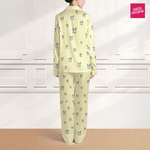 May include: A set of three ceramic mugs with a speckled, matte finish. The mugs are in shades of cream, light gray, and dark gray. Each mug has a simple, minimalist design, perfect for coffee or tea.