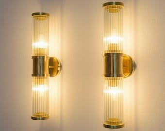 アールデコ調の真鍮と透明ガラスのロッドウォールスコンセのペア