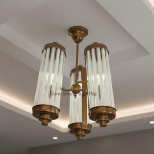 Art Deco Brass Chandelier | Clear & Milk Glass, 3-Cylinder Fixture