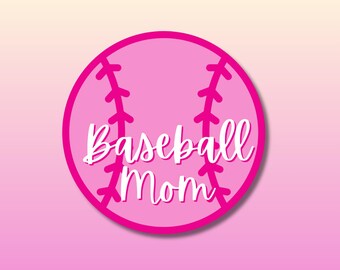 以下が含まれることがあります： 白いステッチと「Baseball Mom」という白い文字が入ったピンクの野球ボール