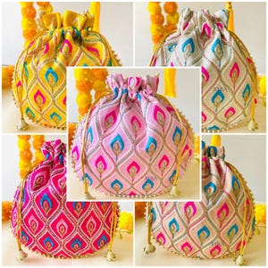May include: A collage of five drawstring pouches in various colors: yellow, pink, and off-white. Each pouch features an embroidered peacock feather design in contrasting colors, with gold accents and beaded trim. The pouches have gold drawstrings and tassels.
