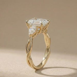 Pear diamond three-stone ring by ExcellentJewels, radiant cut, elegant and modern design. Ideal for engagement, anniversary, or custom jewelry lovers. Handcrafted with high-quality diamonds and precious metal for durability. A sparkling, timeless piece that adds sophistication and personalized elegance to any jewelry collection.