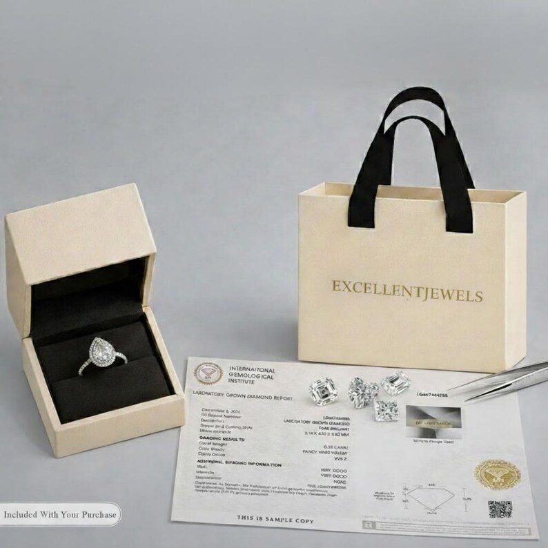 Elegant pear diamond three-stone ring by ExcellentJewels featuring a radiant center diamond and custom gold setting. The side stones enhance the brilliance of the pear-cut diamond, creating a luxurious engagement ring with timeless appeal. Ideal for gifting or marking a milestone occasion with classic sophistication.

Radiant pear three-stone diamond ring from ExcellentJewels, crafted in custom gold for an elegant engagement design. The central pear-shaped diamond is accented.