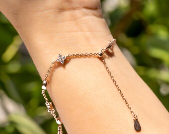Moissanite Station Chain Bracelet — Bezel Set Moissanite & Four-Petal Flower Charm Bracelet in Rose Gold Sterling Silver