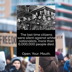 May include: Black and white photograph of a group of people in striped uniforms. Text on the image reads: "The last time citizens were silent against white nationalists, more than 6,000,000 people died. Open. Your. Mouth."