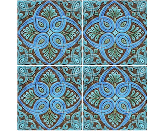 May include: Four square ceramic tiles with a blue, green, and brown geometric pattern. The tiles have a raised, textured design.