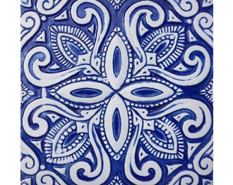 May include: A blue and white ceramic tile with an intricate, symmetrical design. The tile features a repeating pattern of swirls and leaves, creating a traditional and elegant look.