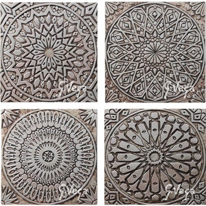 May include: Four square silver tiles with intricate geometric designs. Each tile features a different pattern of circles, stars, and lines.