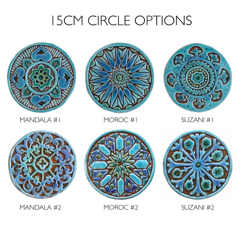 May include: Six 15cm ceramic tiles with different geometric patterns in shades of blue, green, and brown. The tiles are arranged in two rows of three, with the names "Mandala #1", "Moroc #1", "Suzani #1", "Mandala #2", "Moroc #2", and "Suzani #2" printed below each tile.