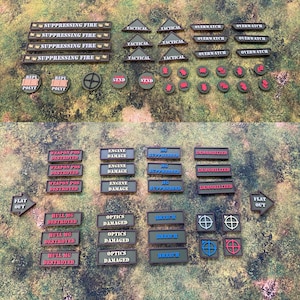 May include: A collection of plastic gaming tokens for tabletop wargaming, featuring rectangular markers with text like Suppressing Fire, Engine Damage, and Weapon Pos Destroyed, alongside triangular tactical markers, circular status icons, and arrow-shaped Flat Out markers.
