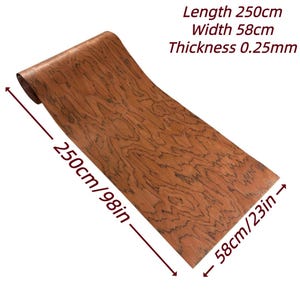 K&ouml;nnte beinhalten: Eine Rolle Holzfurnier mit einem nat&uuml;rlichen Holzmaserungsmuster in Braun- und Schwarzt&ouml;nen. Das Furnier misst 250 cm lang, 58 cm breit und 0,25 mm dick. Der Text auf dem Bild gibt die Abmessungen an.