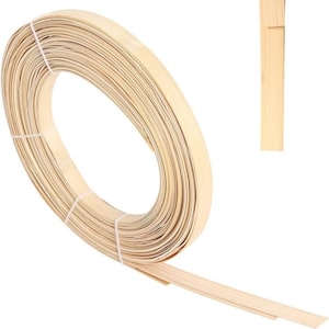May include: A coiled roll of thin, light-coloured wooden strips, secured with white string. A single, rectangular piece of the same wood is to the right. The wood has a natural, light tan colour and appears flexible.