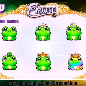 Puede incluir: Una pantalla digital de seis iconos de ranas etiquetados como SUB BADGES y EMOTE. Las ranas son verdes con grandes ojos negros y vientres claros. Las variaciones incluyen una rana simple, una con flor rosa, una margarita, un trébol, una corona dorada y una rana arcoíris.