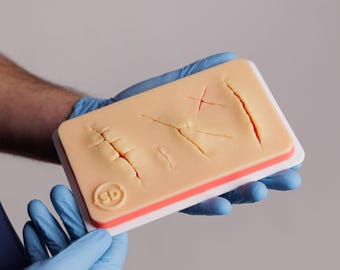 Suture Training Simulator - SD Slice, Realistic Skin Defect Practice, Hypoallergenic Silicone, Surgical Skills Tool
