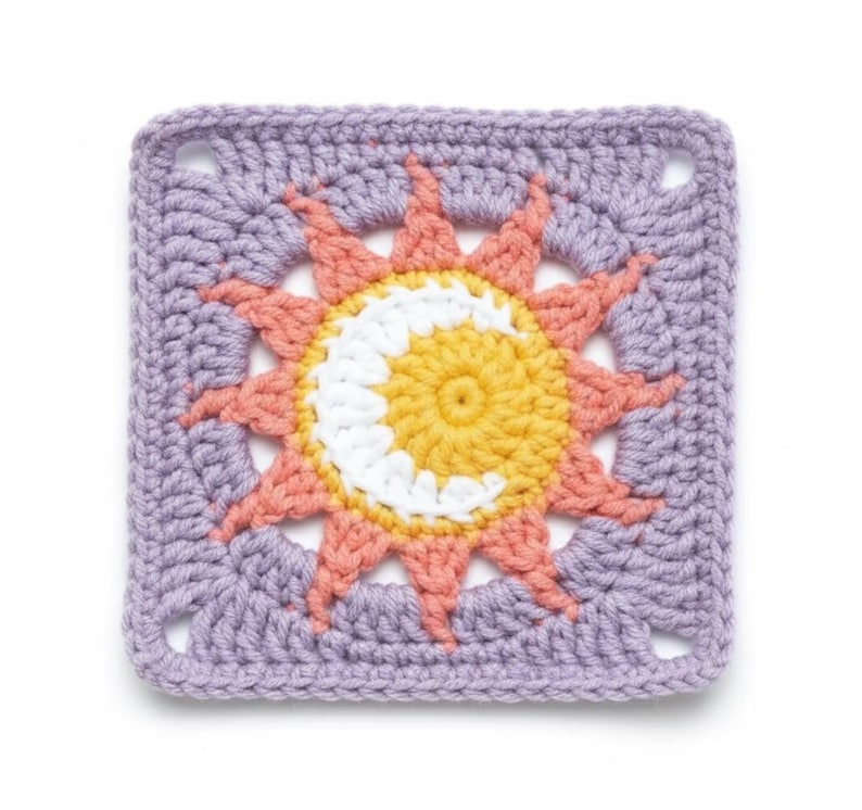May include: A square, crocheted sun design in shades of yellow, white, and peach, surrounded by a lavender border. The sun's rays are peach, and the center is yellow with a white crescent. The corners have small square openings.