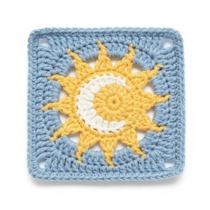 May include: A square, crocheted piece featuring a sun and moon design. The sun is yellow with white accents, and the moon is white. The background is a light blue, and the piece is likely part of a larger craft project.