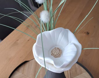 Beautiful 3D-printed poppy made from PLA filament with many uses.