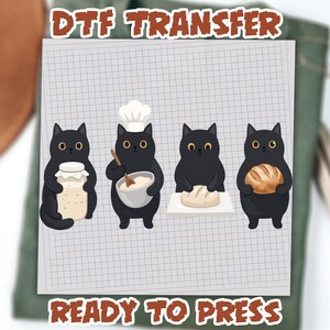 May include: A DTF transfer sheet featuring four black cats baking. The cats are shown holding a jar, mixing in a bowl with a chef hat, kneading dough on a board, and holding a loaf of bread. The text DTF TRANSFER and READY TO PRESS is included.