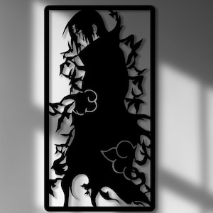 May include: A black metal wall art piece depicting a character from an anime series. The artwork is mounted above a dark wood console table with decorative items. The console has two drawers and a cabinet.