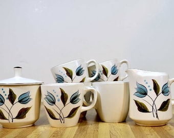 Casual Ceram Hollandia Six Coffee Cups & Coordinating Cream and Covered Sugar Bowl Blue Tulips Green and Brown Foliage Design Pattern