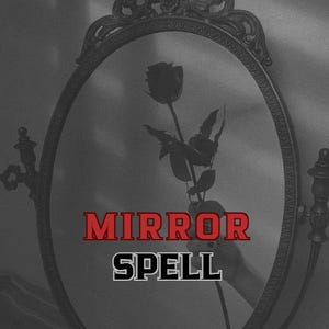 May include: A grayscale image of an oval mirror with ornate detailing. The text "MIRROR SPELL" is displayed in red and white. A hand holds a rose in front of the mirror, creating a shadowy silhouette.