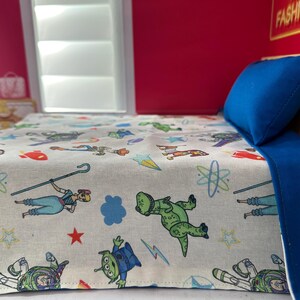 Toy Story themed Handmade Reversible 12” Doll Bedding Set with Pillow. Bild 4