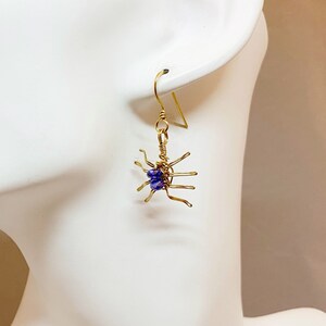 Brass spider earrings with blue crystal spiders (MX-13006-001)