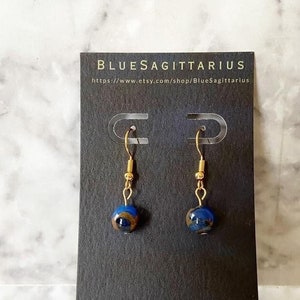 Dark blue sapphire color in quartz with pyrite and 18K gold plated traditional hooks