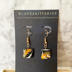 Black and yellow orange matrix faux turquoise rectangular bead drop earrings with 18K plated gold traditional hooks