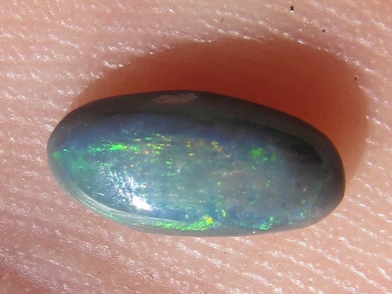 0.60 Ct Australian Black Opal Cabochon 8.5 x 4 mm Natural