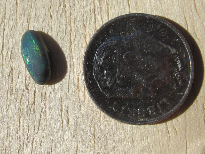 0.60 Ct Australian Black Opal Cabochon 8.5 x 4 mm Natural