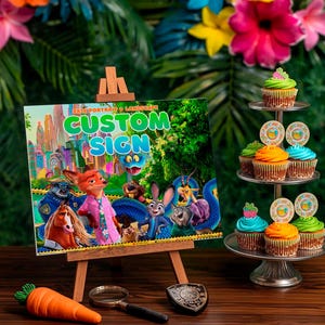 a book titled "Custom Sign" with illustrations of cartoon characters, including a fox, a rabbit, and other animals, along with a wooden easel displaying the book cover. The book is surrounded by a variety of colorful cupcakes and a magnifying glass on a wooden surface.