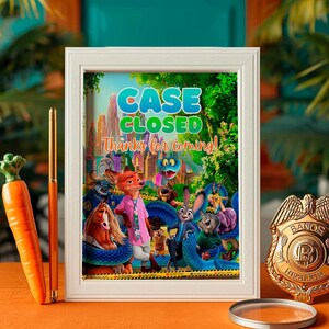 a framed poster with a colorful illustration of cartoon animals, including a police officer, on a table.