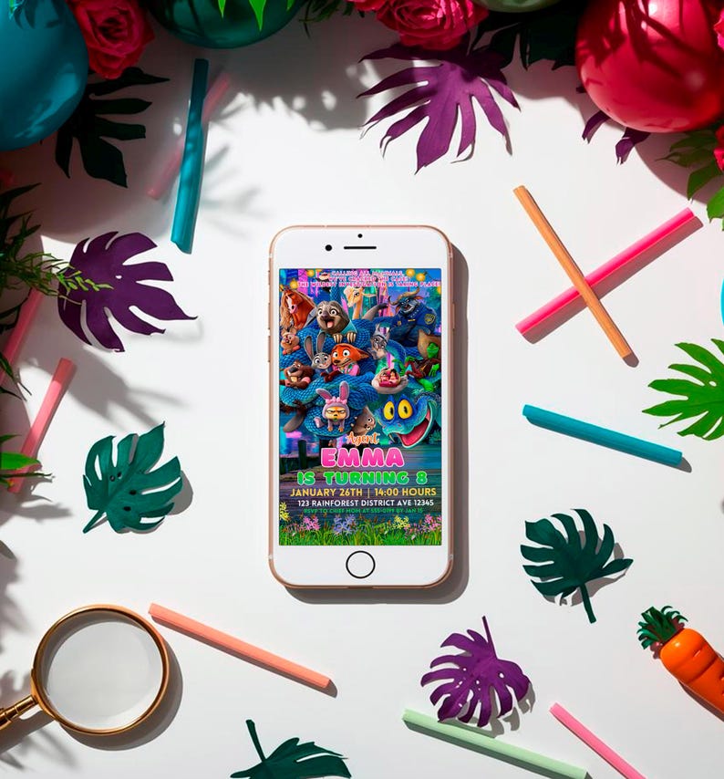 a smartphone displaying a colorful cartoon-style invitation for a birthday party, surrounded by various party decorations and items such as a magnifying glass, a carrot, and a magnifying glass.
