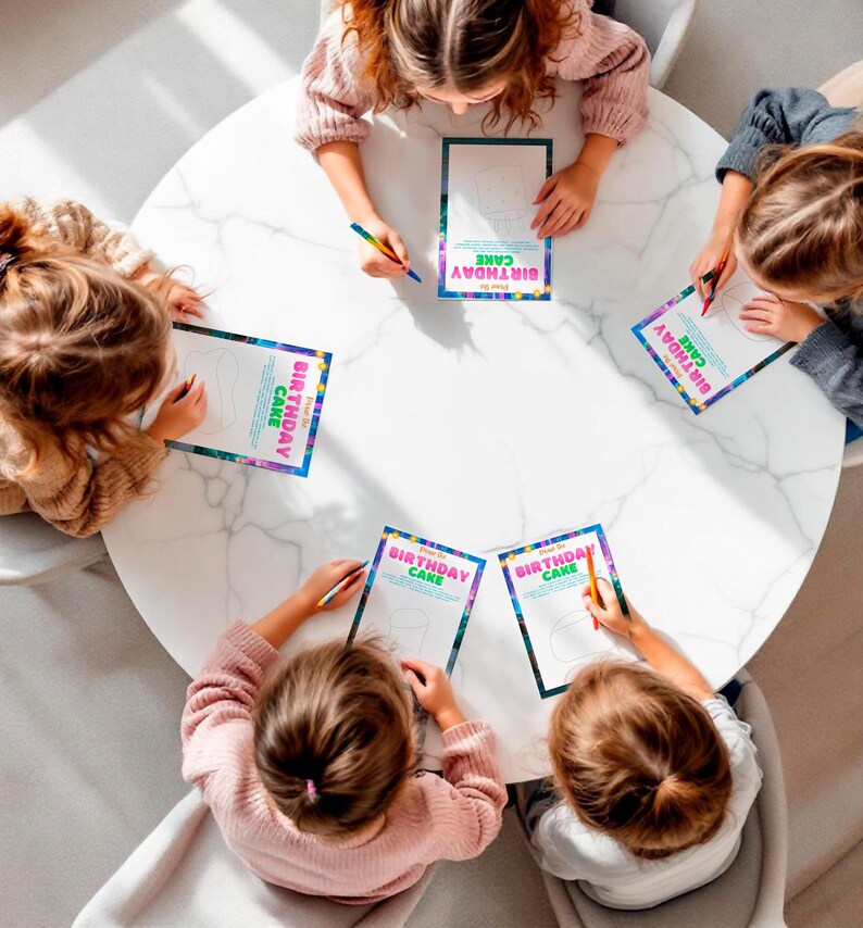 A group of children sitting around a table, engaged in drawing and coloring birthday cards.