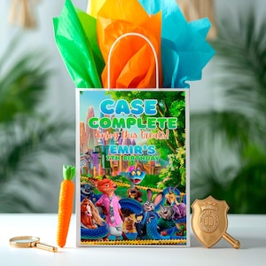 a birthday bag with a cartoon rabbit character on it, along with a magnifying glass and a carrot.