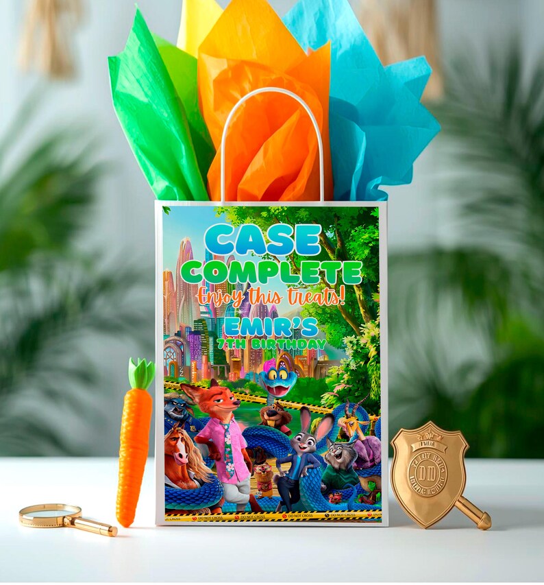 a birthday bag with a cartoon rabbit character on it, along with a magnifying glass and a carrot.