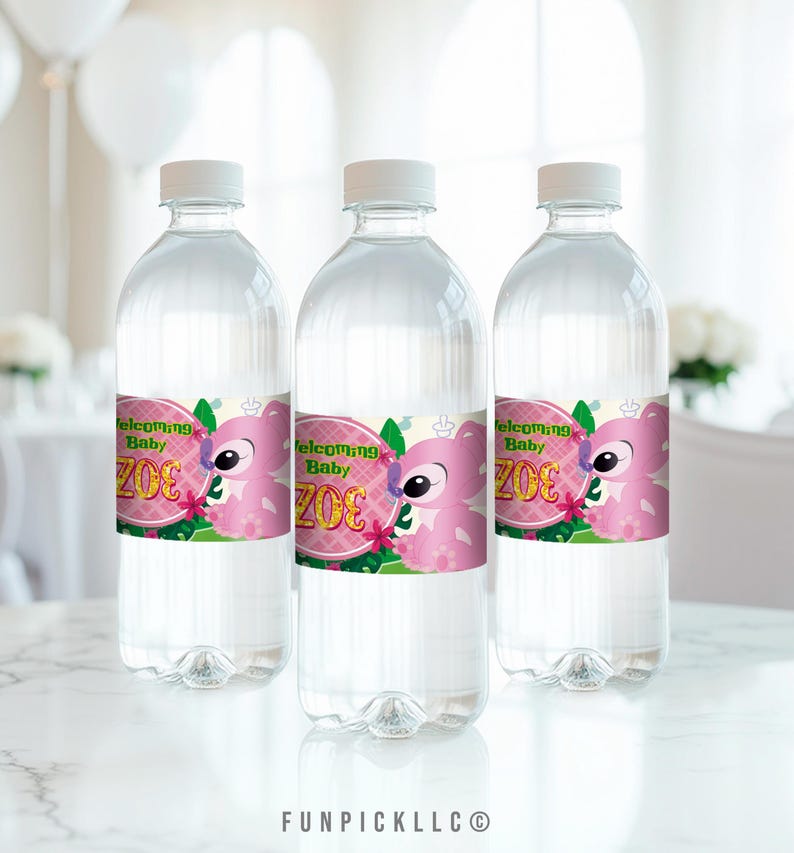 three bottles of water sitting on top of a table