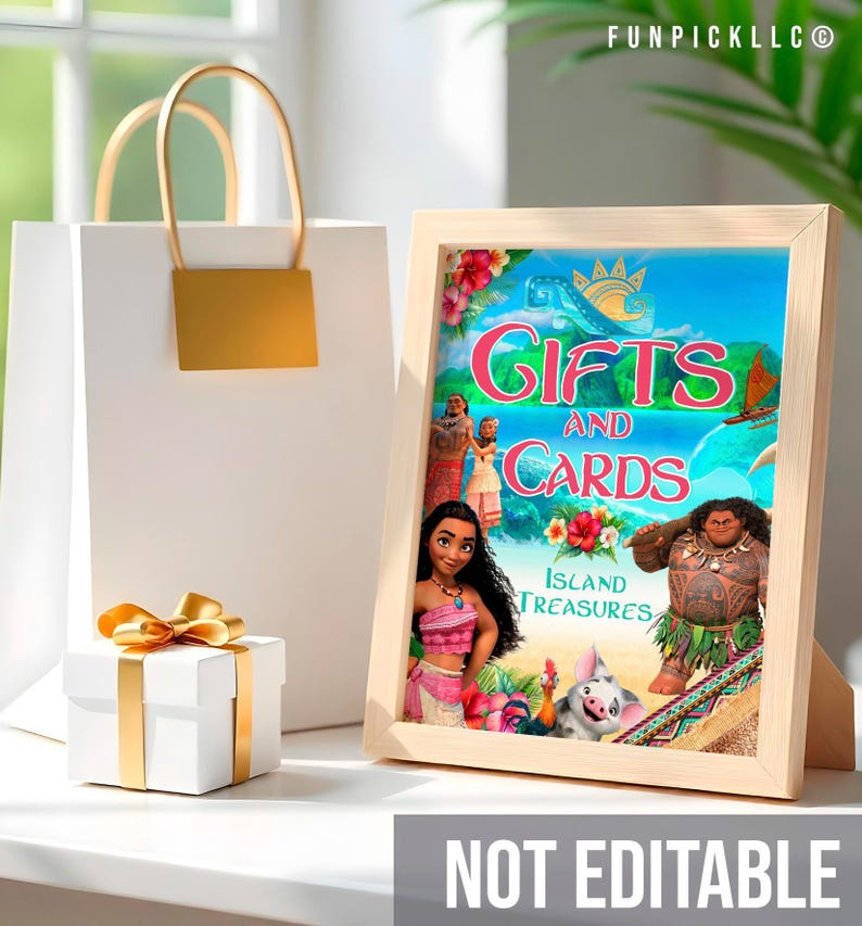 a picture frame sitting on top of a table next to a gift bag