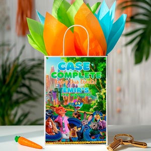 A colorful gift bag with a cartoon character illustration, placed on a table with a carrot and a magnifying glass.