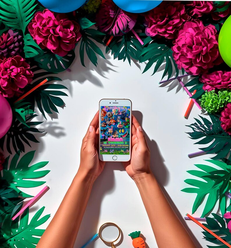 A person's hands holding a smartphone displaying a colorful image, surrounded by a vibrant arrangement of flowers, leaves, and other decorative elements.