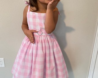 girls pink gingham party dress with built-in pettiskirt and matching bow