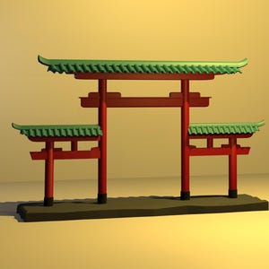Op de afbeelding: Een miniatuur Japanse torii-poort met een rood frame en groene dakpannen. De poort is een traditionele architectonische structuur die vaak te vinden is bij de ingang van Shinto-schrijnen. Het model staat tegen een warme, neutrale achtergrond.