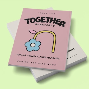 May include: A stack of books with a light green background. The top book is pink with the words "TOGETHER QUARTERLY" and a flower illustration. Text on the cover reads "UNPLUG. CONNECT. MAKE MEMORIES. FAMILY ACTIVITY BOOK."