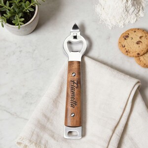 May include: A white ceramic mug with a black handle and the text "But First, Coffee" in a handwritten style. The mug is likely 12 ounces in capacity, perfect for a morning beverage.