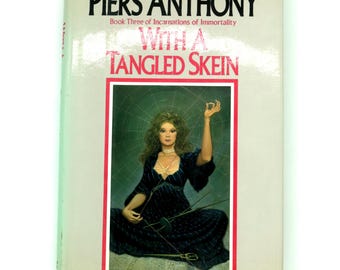 Con un gomitolo aggrovigliato, di Piers Anthony / 1985 prima edizione copertina rigida / Fantascienza Fantasy