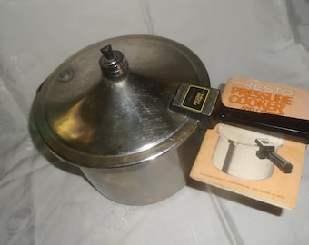 1970s Presto Stainless Steel Pressure Cooker. 6 quart W/Booklet